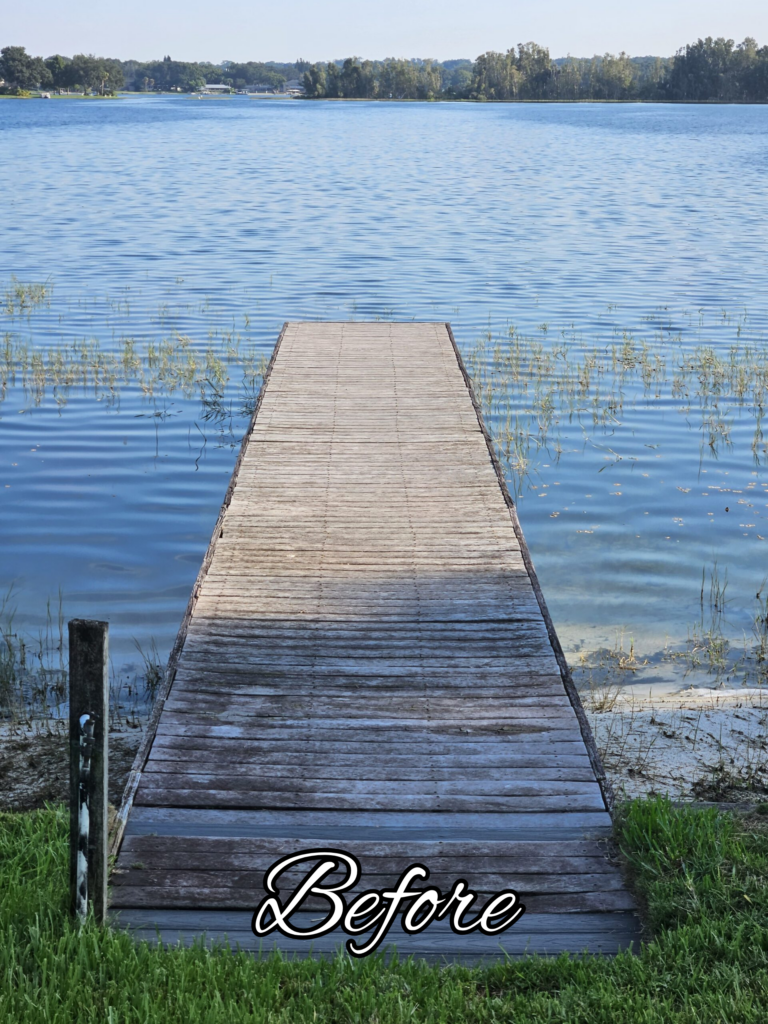 Wooden dock extending into calm blue lake