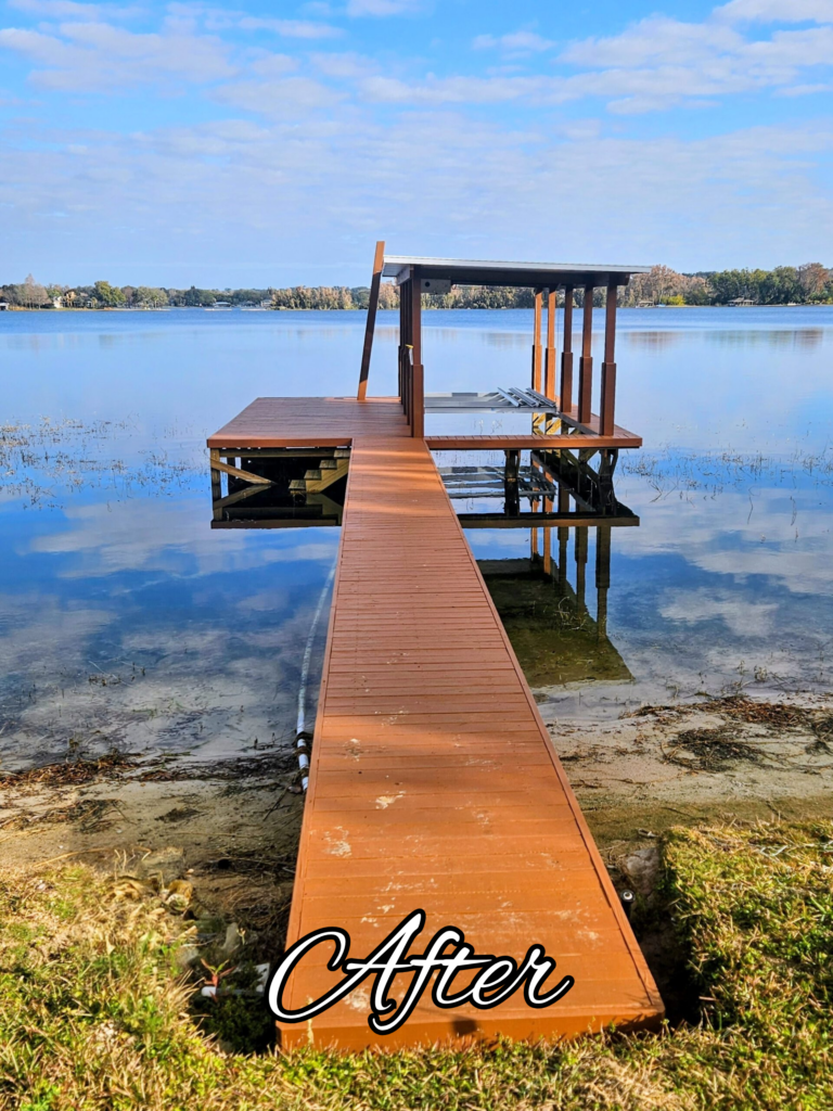 Wooden dock leading to covered boat lift
